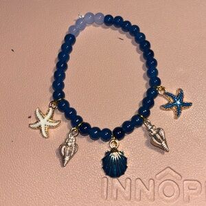 Sitting by the seashore handcrafted bracelet by me